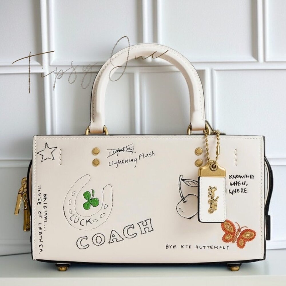 NEW!! Coach Rogue 25 Tote Bag With Dinosaur & Lucky Drawings In Chalk White Leat